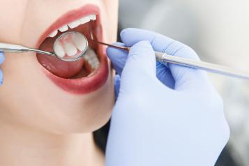 Dental patient having their teeth checked